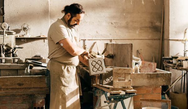 diabetic-craftsman-places-barcelona-panot-tile-on-2025-01-09-06-40-06-utc (1) (1)